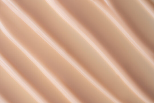 Close-up body cream texture background with soft light