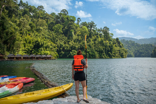Kayaker on Cheow Lan Lake in Khao Sok National Park
