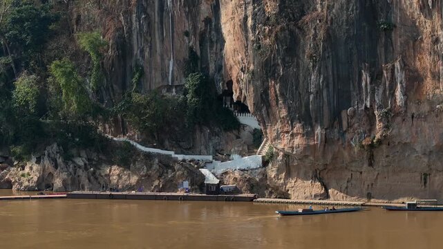 Buddhist shrine in Pak Ou Caves, Tham Tring cave, confluence of the Ou and Mekong rivers, Luang Prabang, Laos. Aerial