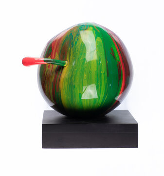 Colored artificial art apple isolated on white background
