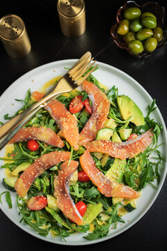 Salad with salted salmon and arugula