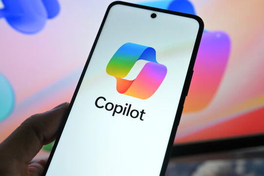 VEHARI, PAKISTAN - JULY, 27, 2026: Close up of mobile phone screen showing Microsoft Copilot app for business productivity