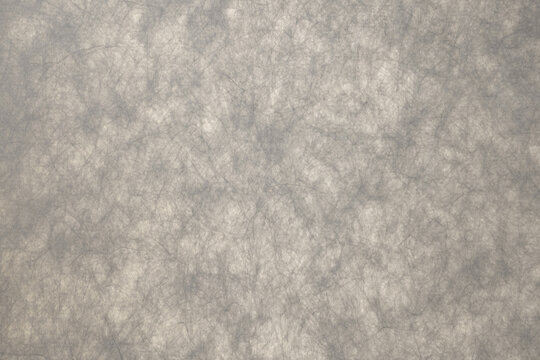 gray handmade paper texture with natural fiber patterns background