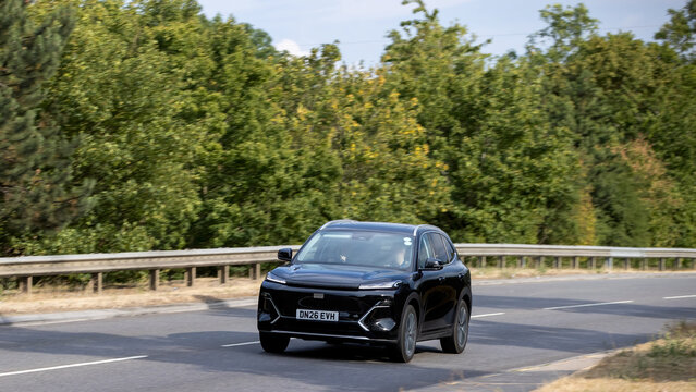 Milton Keynes,UK - July 24th 2026: 2026 black Geely Starray hybrid electric Chinese SUV car driving on a British road