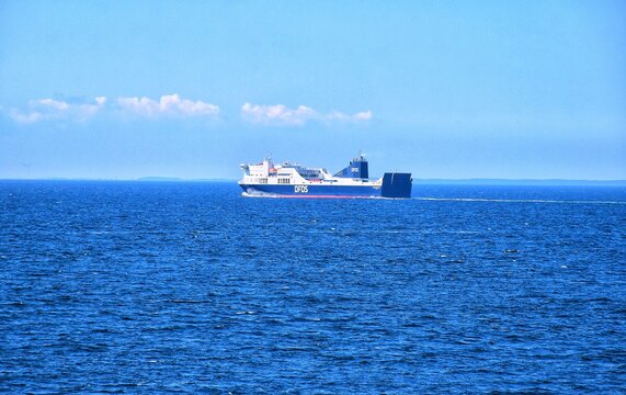 July 10, 2026, Denmark. A DFDS freight ferry sails through the sea. Maritime passenger and freight transportation.