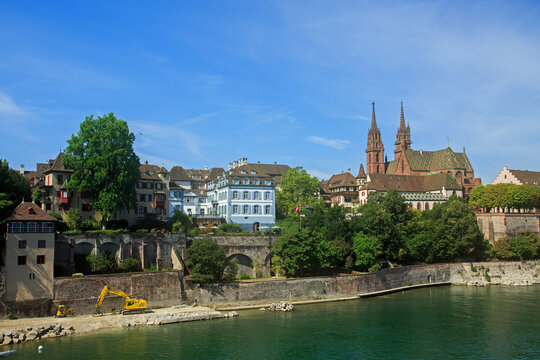 Landscape of Basel on the Rhine River with the Basler M&uuml;nster (Cathedral) which is probably the most famous landmark in Basel, it has red sandstone walls, colourful roof tiles and twin towers