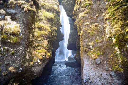 entrance to the Gljufrabui waterfall inside a canyon near Seljalandsfoss on a March day