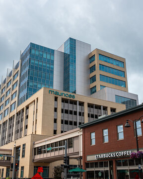 Duluth, MN, USA - Jul 25, 2026: Downtown architecture with skyway, Maurices corporate building, Starbucks Coffee shop, and other buildings.