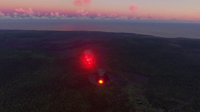 Circular aerial shot at sunset of Pu&lsquo;u &lsquo;Ō&lsquo;ō Crater Eruption in Hawaii. United States