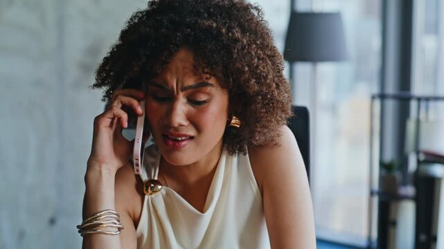 Upset woman arguing phone call office. Close up frustrated businesswoman