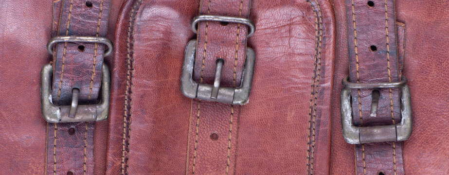 old vintage leather belts on a jacket