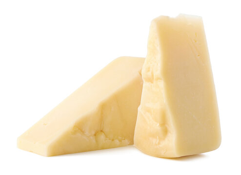 Parmesan cheese pieces on white background