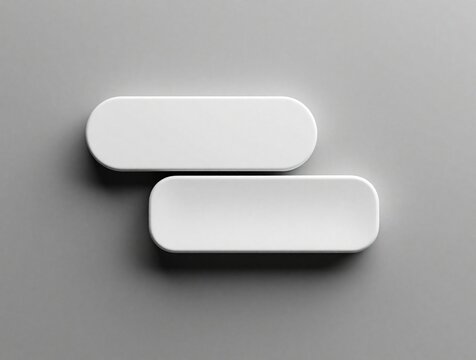 Two white rounded rectangles overlap on gray background. Blank spaces for text or design elements. Minimalist graphic, modern template, clean layout. Digital interface concept.