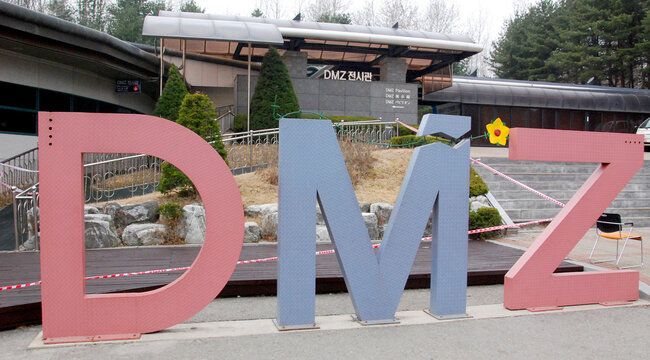 DORASAN, SOUTH KOREA: DMZ sign. The Korean Demilitarized Zone is a strip of land running across the Korean Peninsula that serves as a buffer zone between North and South Korea.