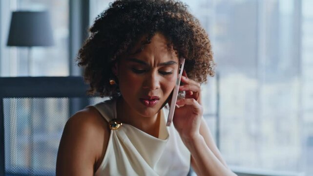 Stressed business woman arguing phone call office. Upset lady bad news reaction