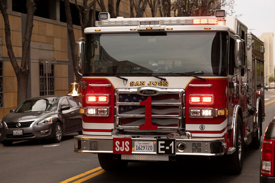 San Jose, California, USA - March 30, 2026: San Jose FIre Department Engine 1 responds to the scene of an emergency on a city street.