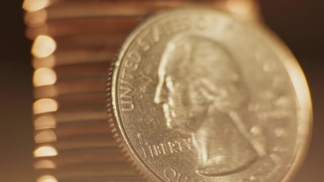 Close-up detailed macro view of George Washington on United States of America 25 cents coin worth one quarter of a dollar and quoting liberty and In God We Trust on money surface and U.S. currency 4k