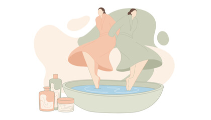 Fototapeta premium Two women in bathrobes relaxing in a large spa water basin with cosmetics.