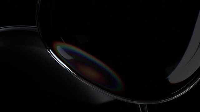 Floating bubbles on black background, 4k seamless loop 3d animation