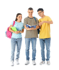 Fototapeta premium Happy students with backpacks and notebooks reading book on white background