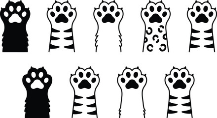 Cat Paw Silhouettes And Outlines On White Background A Collection Of Animal Footprints print feline kitten pad toe beans footprint track silhouette black isolated vector © Abdullah_creativity