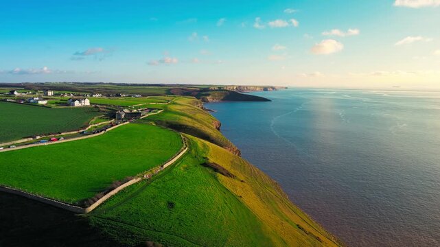 Aerial drone View of Coastal path with stunning views of Jurassic coast in the distance. Ogmore South Wales uk