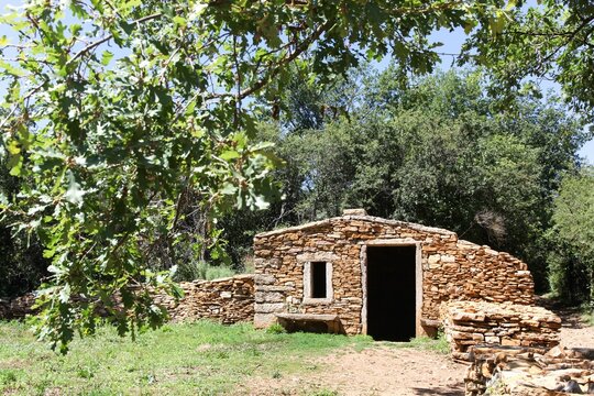 Old and typical stone hut called caborne in French language in Saint Cyr au Mont d'or, France