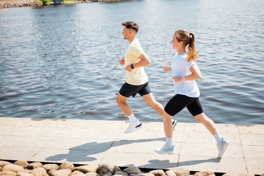 Jogging along the serene riverside brings a sense of peace and vitality to early morning routines
