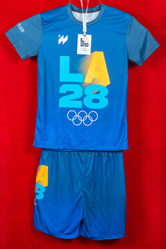 ZHONGSHAN China-April 12 2026: LA28 Los Angeles 2028 Olympic themed blue short sleeve sports suit with hang tag.