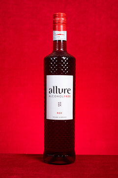 ZHONGSHAN China-February 9 2026: Allure non-alcohol red wine inside textured glass bottle.