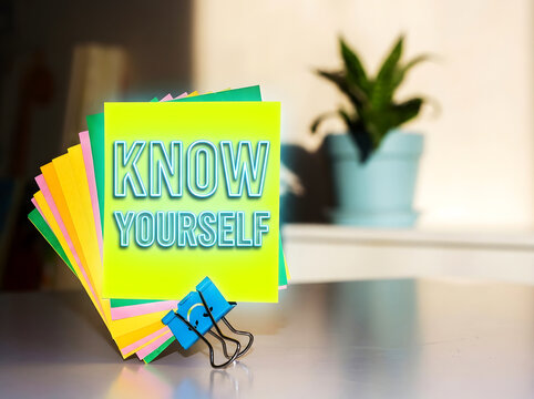 Know Yourself Inspirational Neon Yellow Sticky Note Mockup With Blue Binder Clip On Modern Office Desk Symbolizing Self Awareness Personal Growth And Positive Thinking