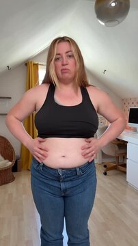 gut inflammation and muffin top in a pair of jeans that are too tight