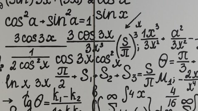 mathematical formulas, equations and geometric diagrams on chalkboard	