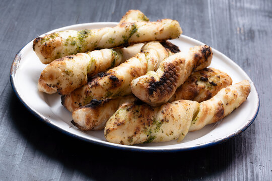 plate of italian garlic pesto pizzetta