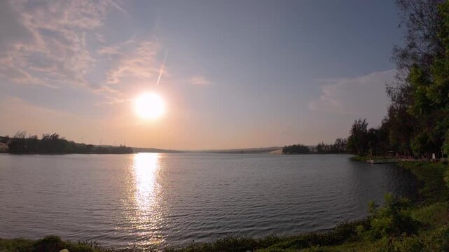Golden Hour Sunset Reflection on Bau Trang Lake Vietnam