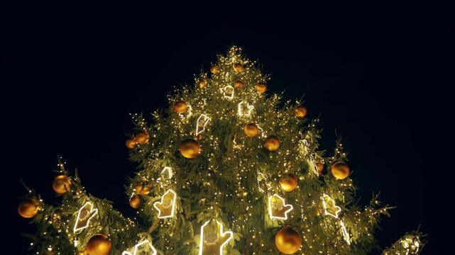 Golden festive lights and Latvian folk mitten ornaments brighten a magical winter night