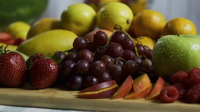 All sorts of delicious fruit on counter - closeup, tracking shot