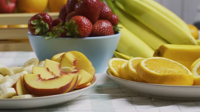 Smoothing closeup, tracking shot of delicious looking fruit on kitchen counter