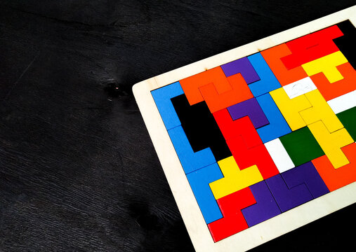 Puzzle with brain sharpening concept on black background