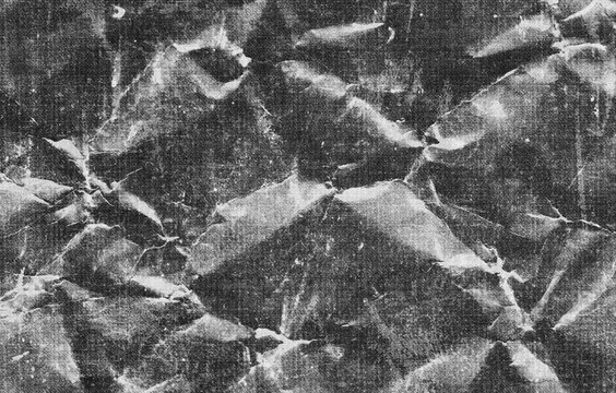 Gritty black crumpled fax paper texture background with distressed thermal noise, heavy folds, and vintage analog copier lines, perfect as a graphic design photo overlay