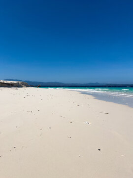Idyllic Beach Scene with White Sand and Turquoise Water