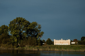 Fototapeta premium Syon house estate by river thames under dramatic sky