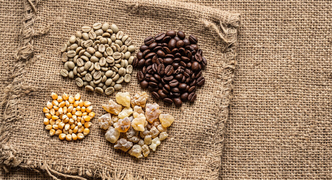 Cinematic flat lay of Ethiopian Buna coffee ceremony elements on burlap