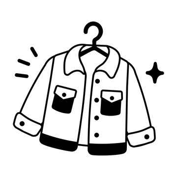 Blue denim jacket displayed on a hanger with pockets and decorative details.
