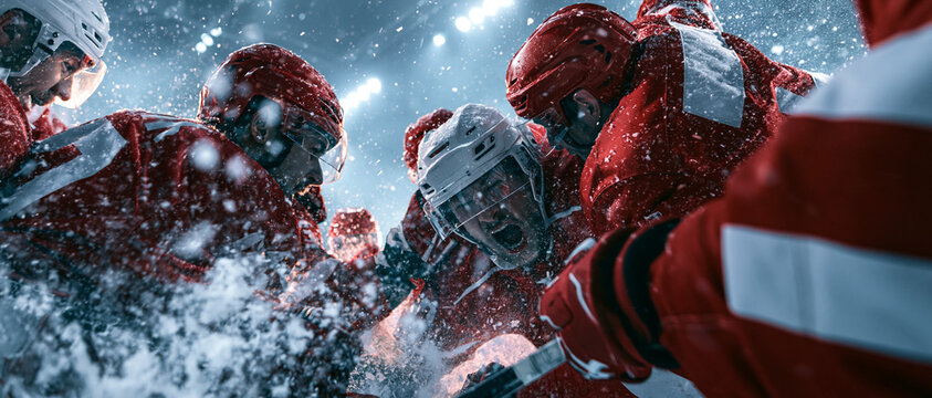 Ice Hockey Game Night: Athletes in Action Battling for Championship Victory in High Stakes Team Sport Competition