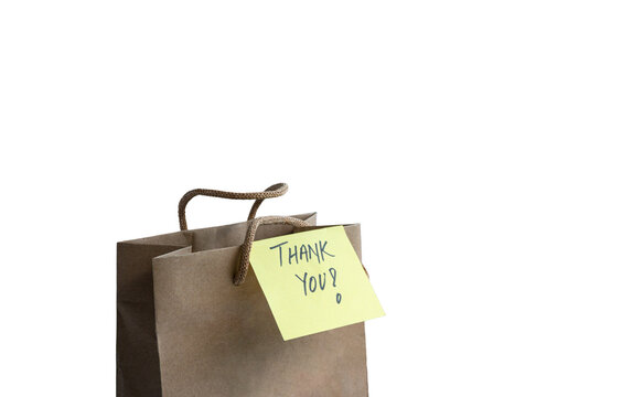 Brown Paper Shopping Bag with Thank You Note. Isolated on transparent background.