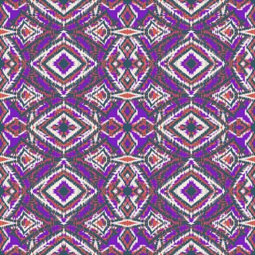 Seamless ethnic ikat pattern with vibrant orange and yellow geometric diamond motifs on a dark brown background. Bold tribal fabric design perfect for bohemian prints, wallpaper, and creative decor.