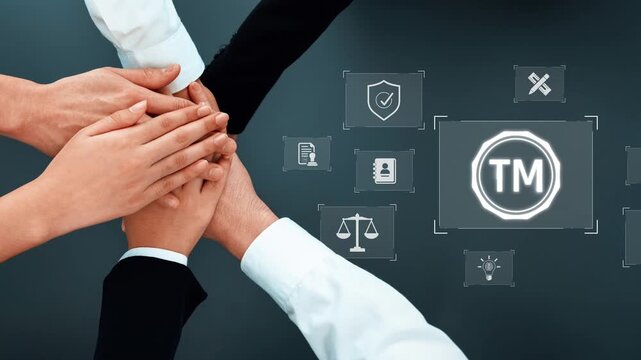Hands coming together symbolize collaboration and teamwork in a business context focused on trademark protection and legal compliance amid digital interactions. Raster