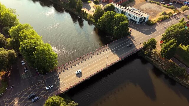 Overhead 4K 60FPS aerial GV video of Ormeau Bridge in South Belfast, Northern Ireland in the UK. Produced of a summer evening with Rec709 color.