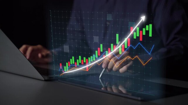 A modern businessman closely examines financial data displayed on a laptop. The stock market graph illustrates growth trends, highlighting economic success and investment potential. Copula